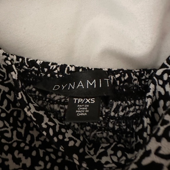 Black and white dynamite tank top. Loose fitted. Great condition. Only worn once - Picture 2 of 3